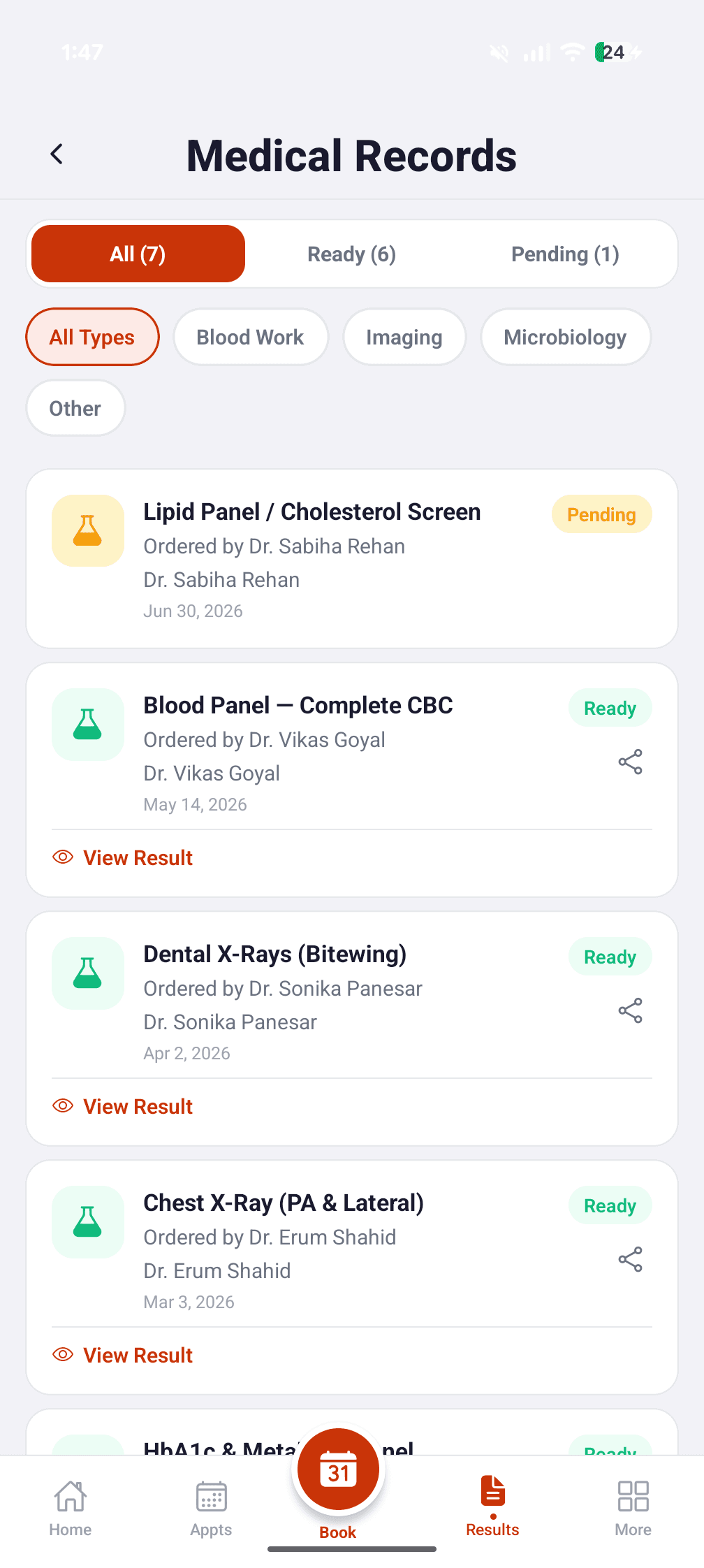 Lab results list showing test names, dates, and status badges